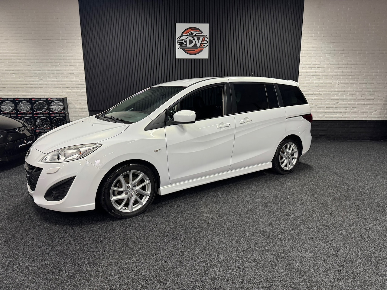 Mazda 5 - 2.0 GT-M 2.0 GT-M, NAVIGATIE, ELEK SCHUIFDEUREN, LEER, PARELMOER, 7 ZITTER - AutoWereld.nl