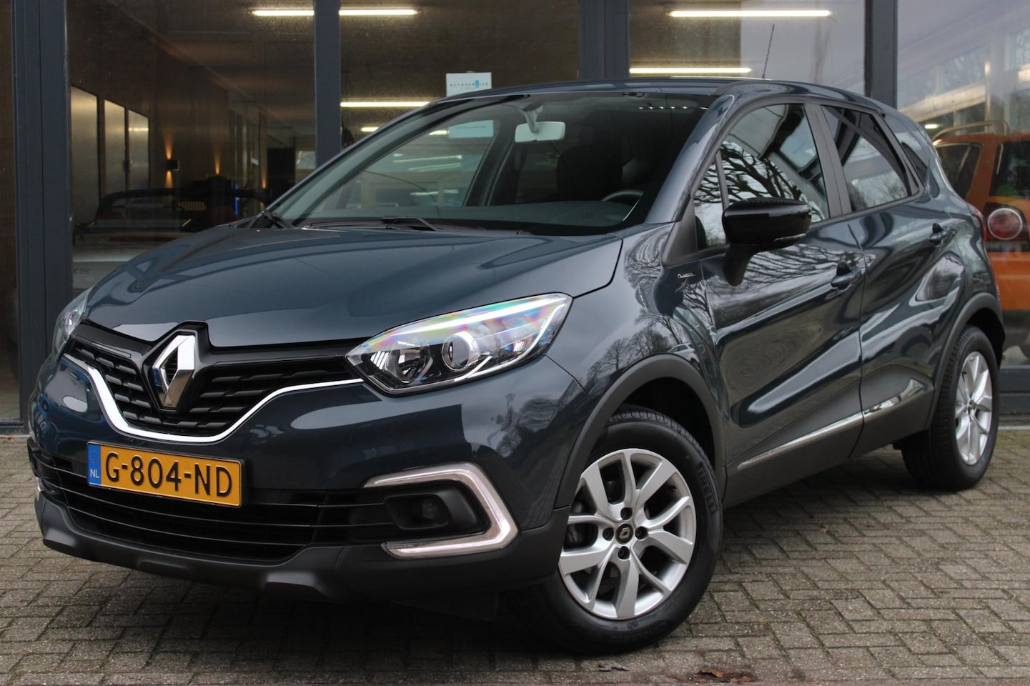 Renault Captur - 0.9 TCe Limited | Cruise Control | Navigatie | Trekhaak 1200kg | Keyless | Airco | Parkeer - AutoWereld.nl