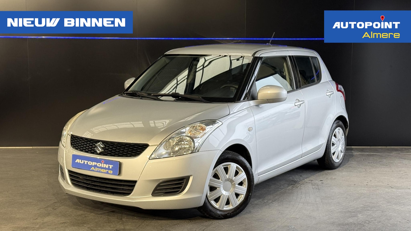 Suzuki Swift - 1.2 Comfort EASSS | Trekhaak | Airco | Stoelverwarming - AutoWereld.nl