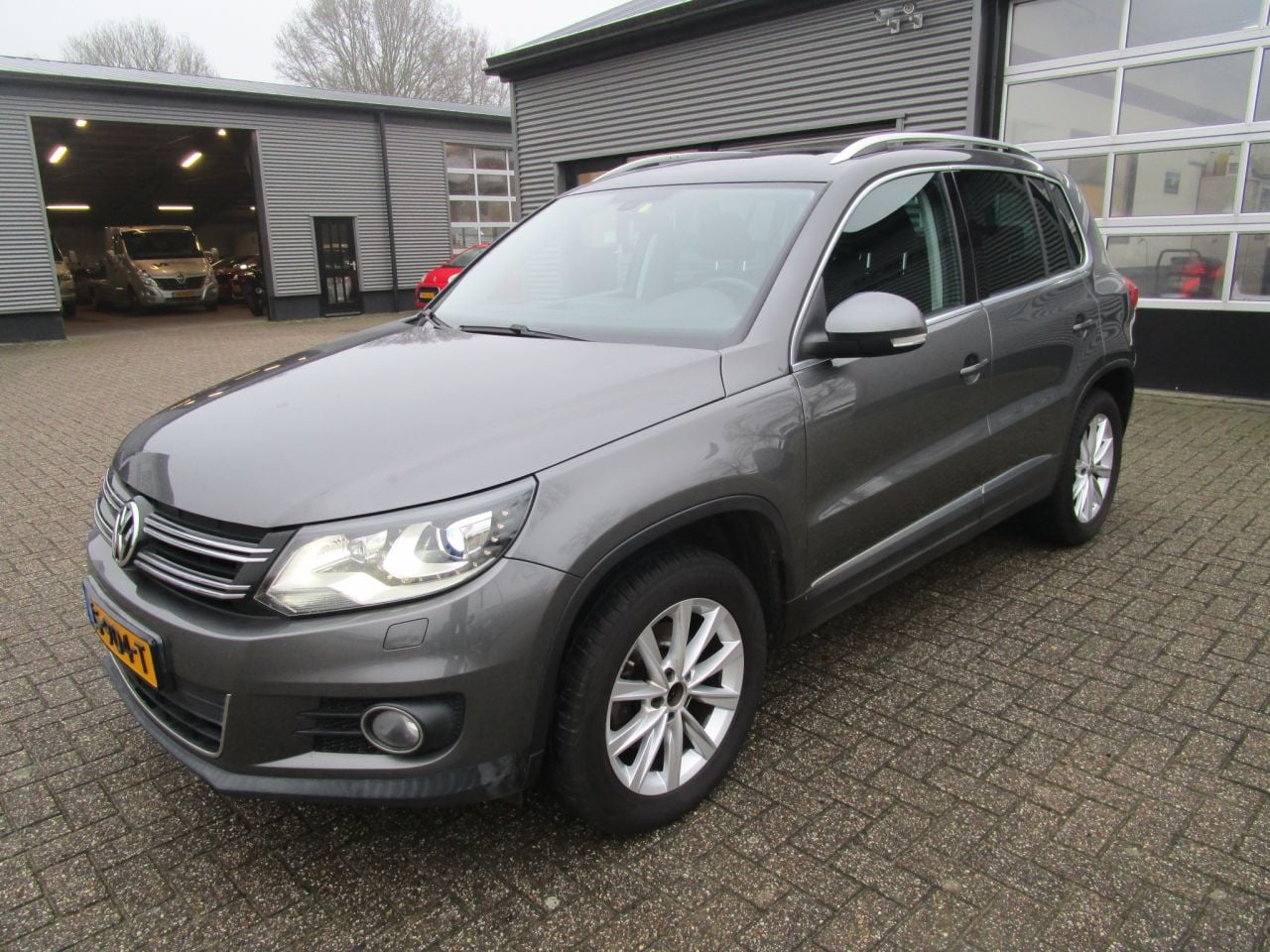 Volkswagen Tiguan - 1.4 TSI Sport & Style - AutoWereld.nl