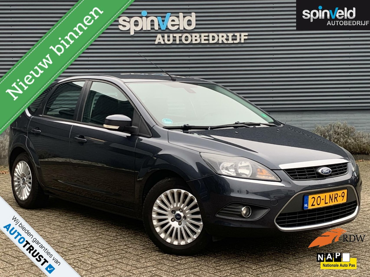 Ford Focus - 1.8 Limited Flexi Fuel BJ`10 NAP NL Navi Cruise Trekhaak - AutoWereld.nl