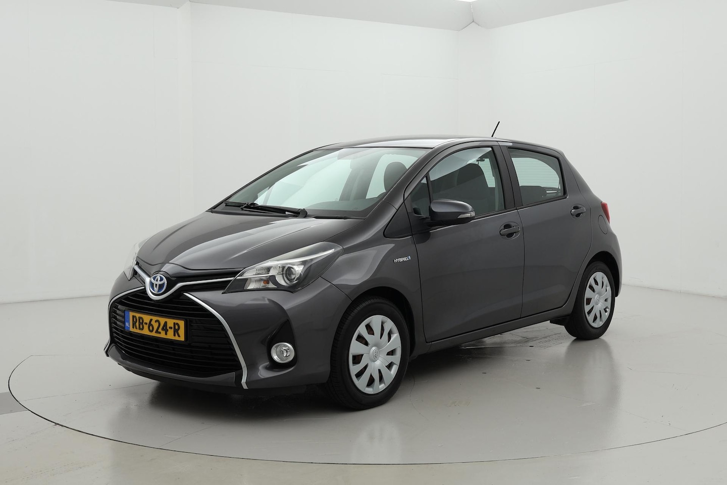 Toyota Yaris - 1.5 Hybrid Aspiration Navigatie Automaat - AutoWereld.nl