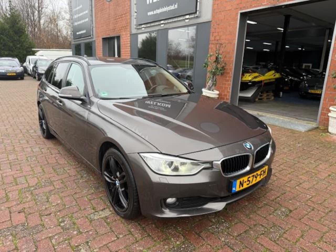 BMW 3-serie Touring - 318d High Executive AUT - AutoWereld.nl