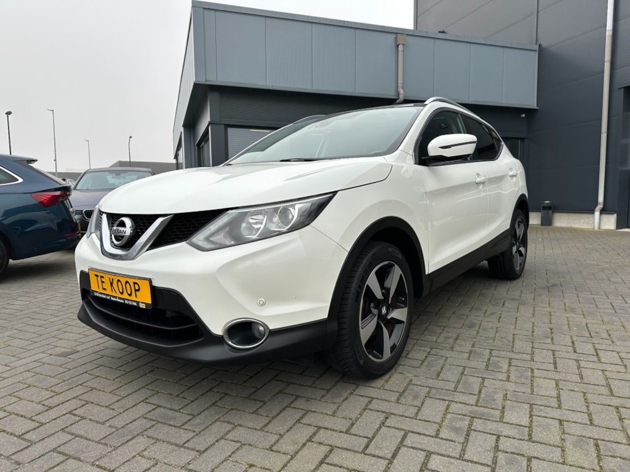 Nissan Qashqai - 1.2 N-Connecta Navi Camera Panoramadak - AutoWereld.nl