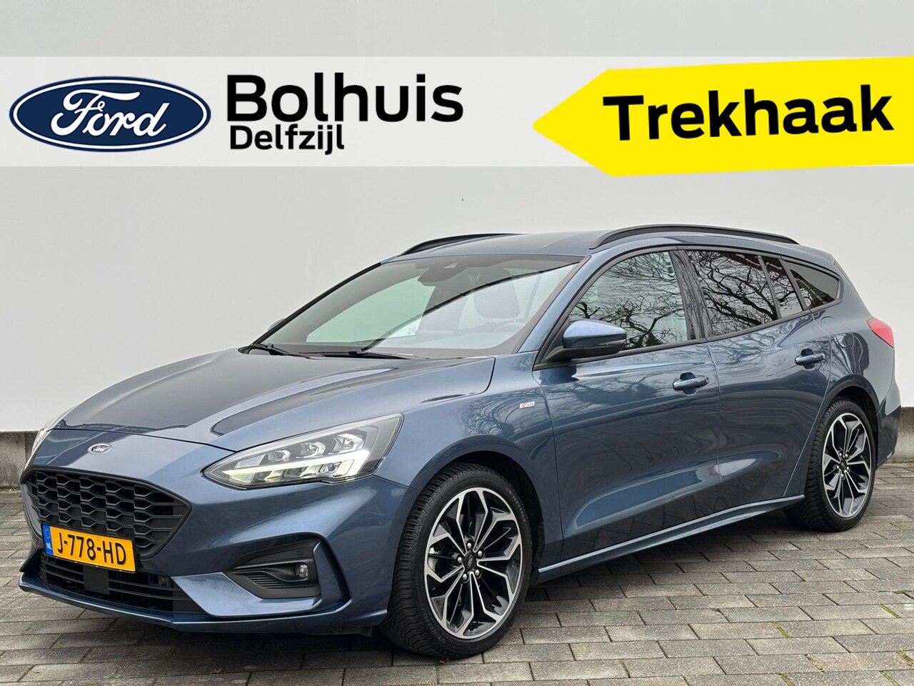 Ford Focus Wagon - EcoBoost 125 pk ST Line | Trekhaak | Winter Pack | Full LED | 18" | Keyless entry | 4 seiz - AutoWereld.nl