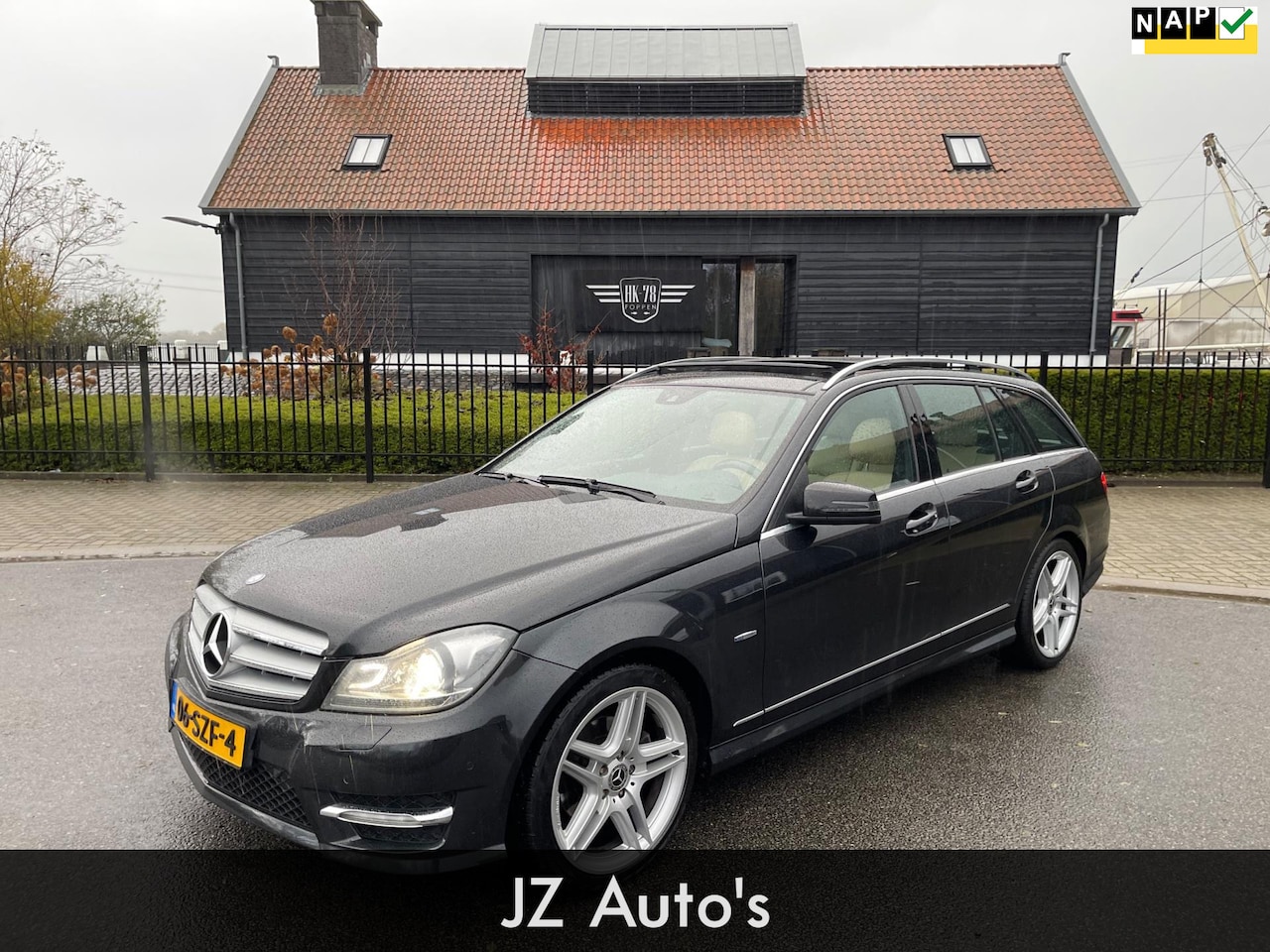 Mercedes-Benz C-klasse - 200 AMG AUTOMAAT PANORAMADAK LEER NAVI XENON FACELIFT - AutoWereld.nl