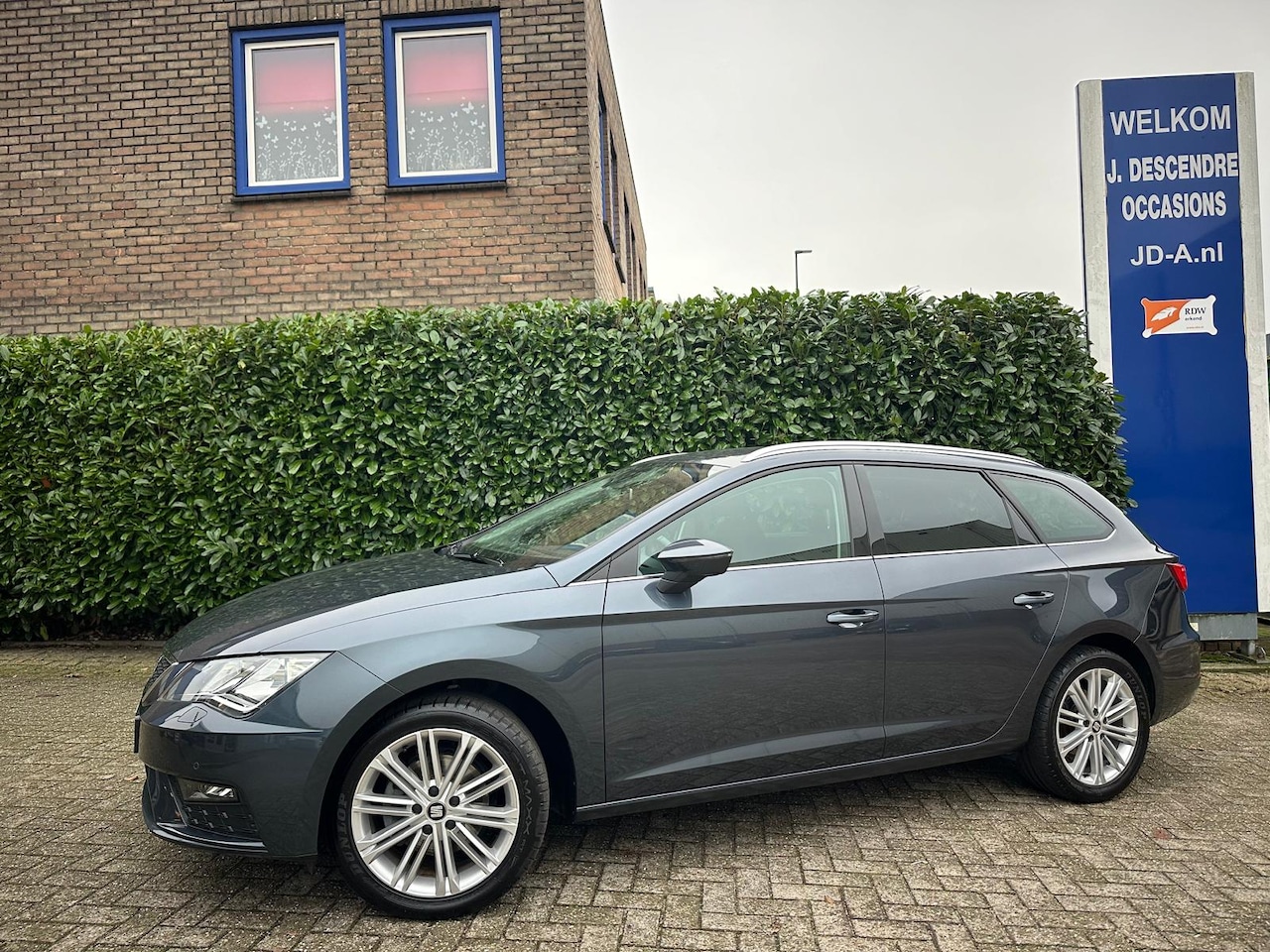 Seat Leon Sportstourer - 1.5 TSI Style Launch Edition Climate C, Cruise C, Stoelverw, Navigatie!!!!! - AutoWereld.nl