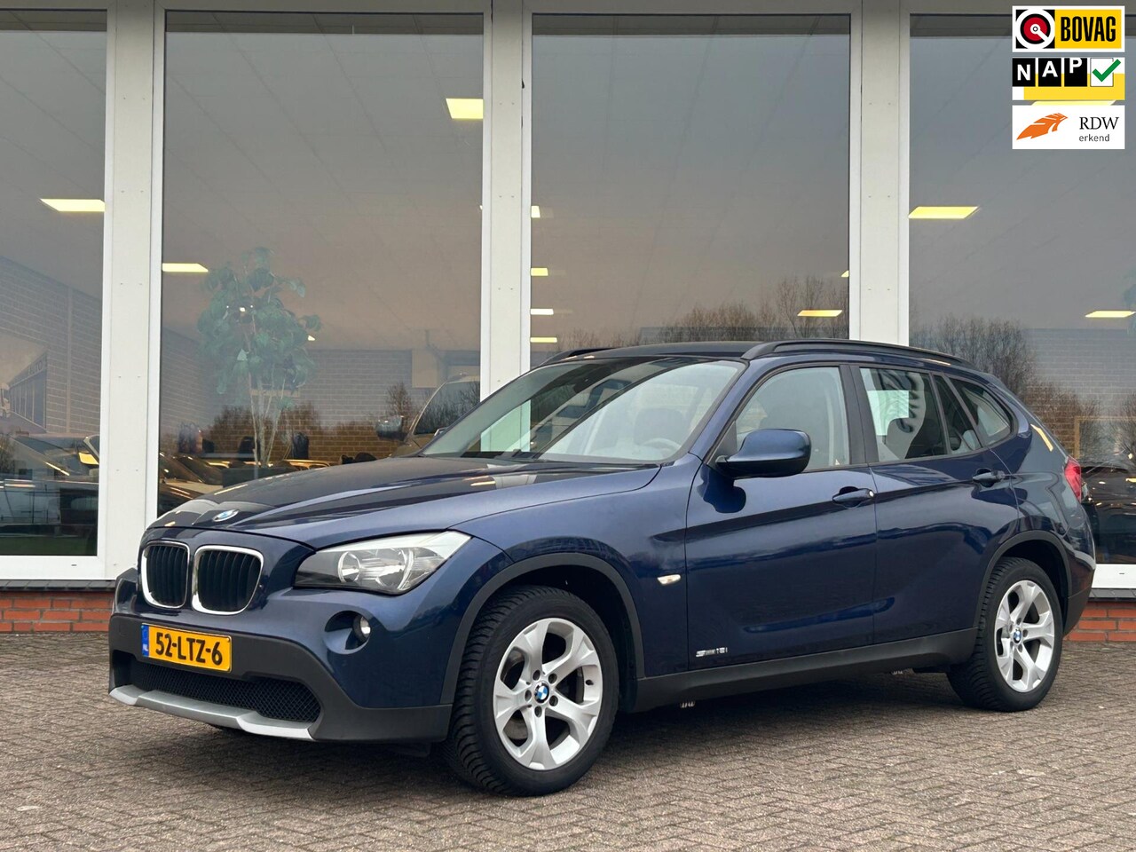 BMW X1 - SDrive18i Executive -Navi - PDC - LM - AutoWereld.nl