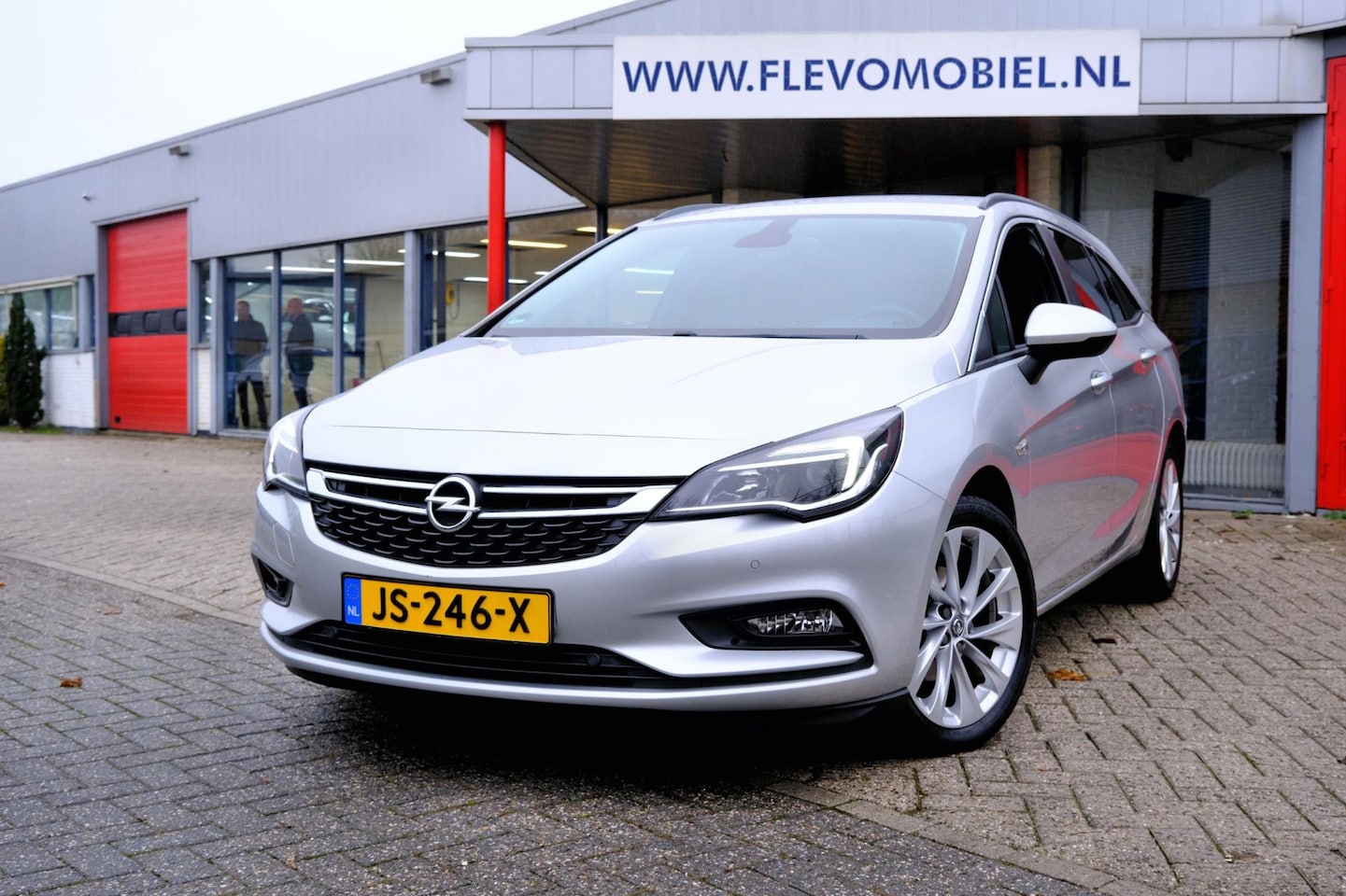 Opel Astra Sports Tourer - 1.0 Edition *68.994km!* Navi|Clima|LMV - AutoWereld.nl