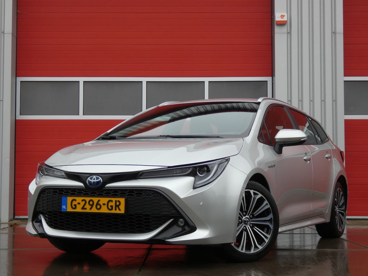 Toyota Corolla Touring Sports - 1.8 Hybrid Business Intro/ lage km/ zeer mooi! - AutoWereld.nl