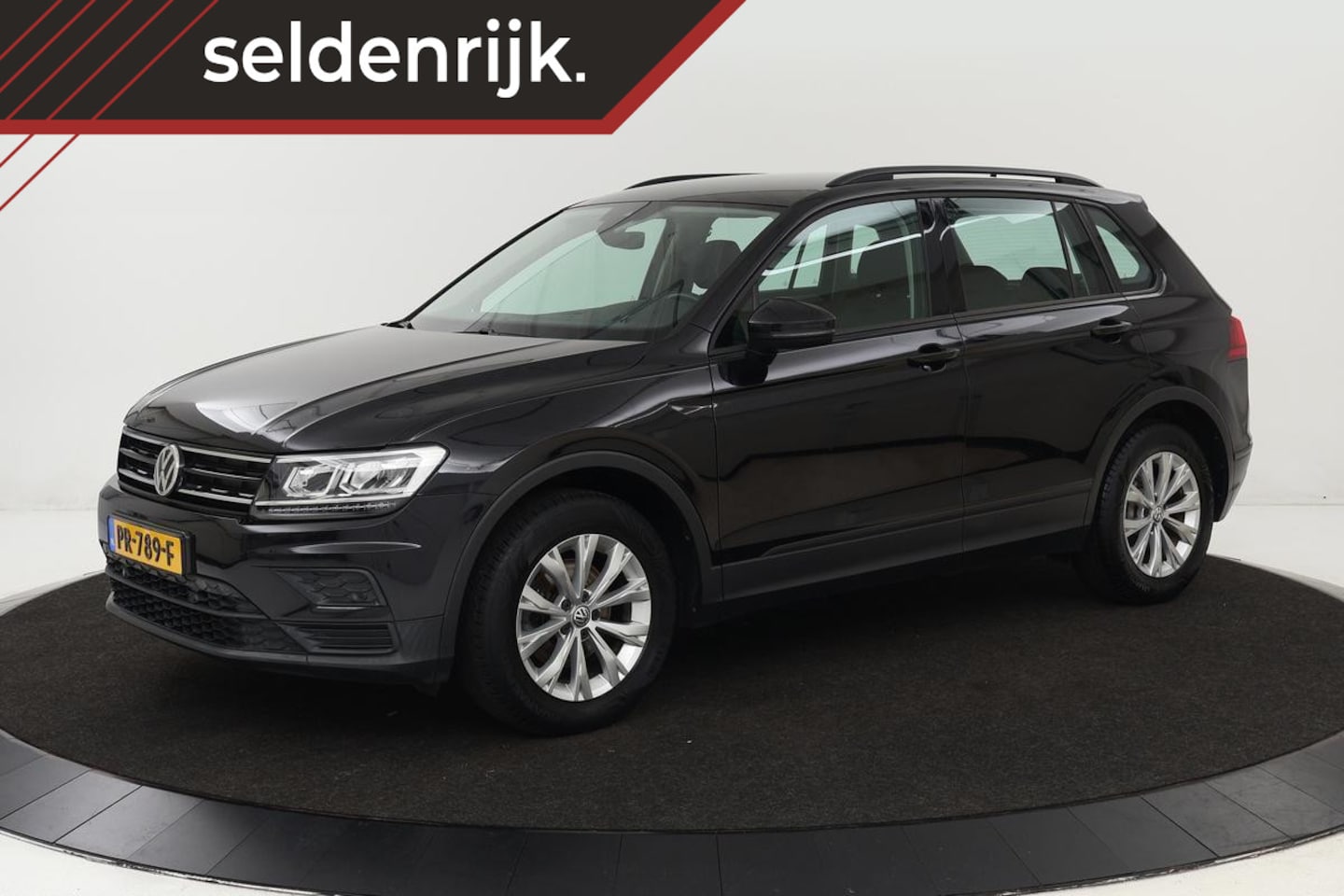 Volkswagen Tiguan - 1.4 TSI Comfortline | Stoelverwarming | Full LED | Keyless | Trekhaak | Carplay | Navigati - AutoWereld.nl