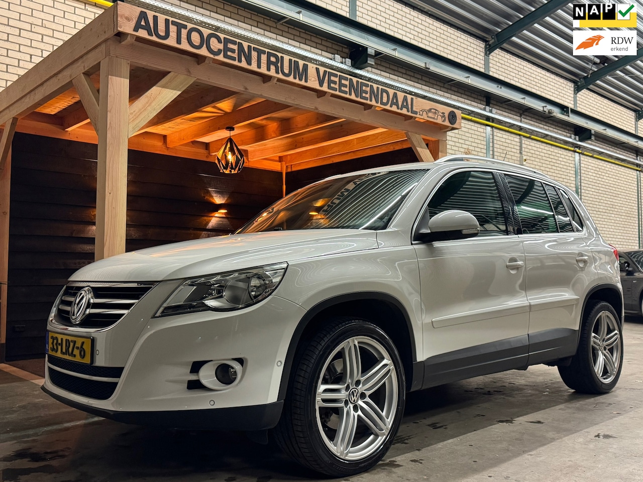 Volkswagen Tiguan - 1.4 TSI Sport&Style TREKHAAK/NL-AUTO/19''/PDC/CRUISE - AutoWereld.nl