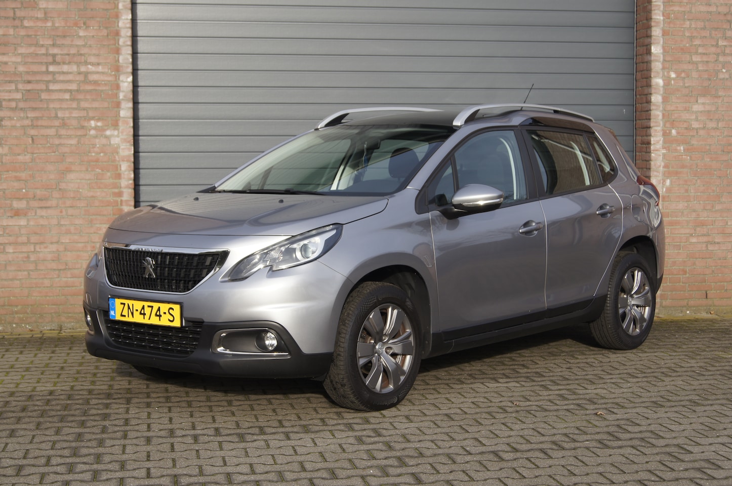 Peugeot 2008 - 1.2 PureTech Blue Lion Navigatie, Airco, Parkeersensoren. - AutoWereld.nl