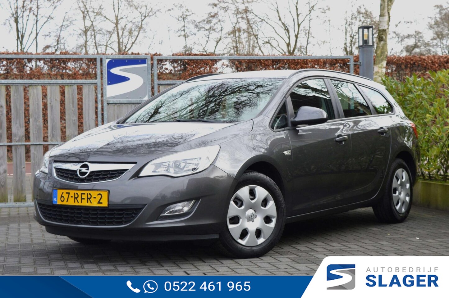 Opel Astra Sports Tourer - 1.4 Edition | Navi | PDC - AutoWereld.nl