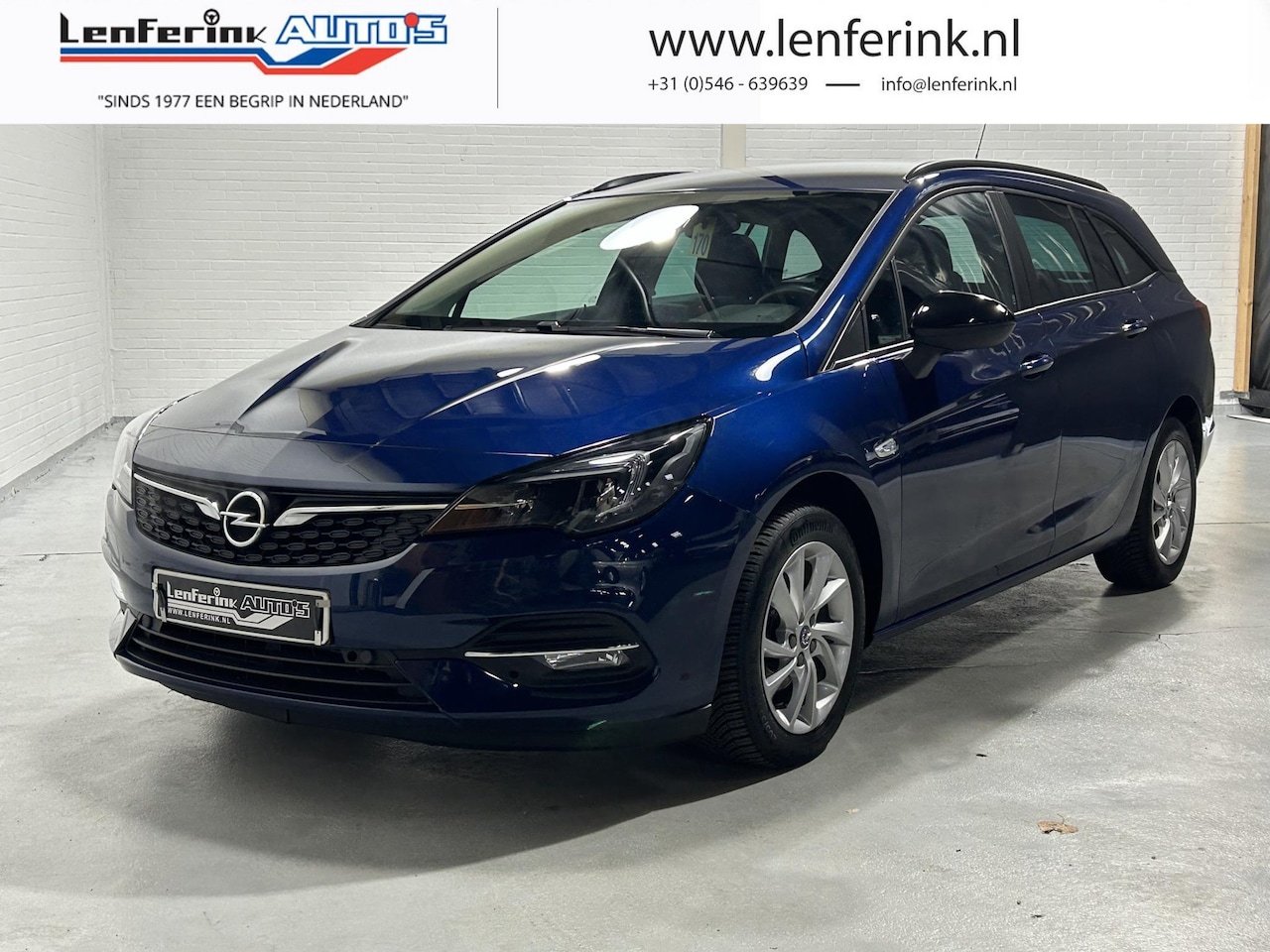 Opel Astra Sports Tourer - 1.2 Business Edition Navi Cruise Stoelverwarming Camera - AutoWereld.nl