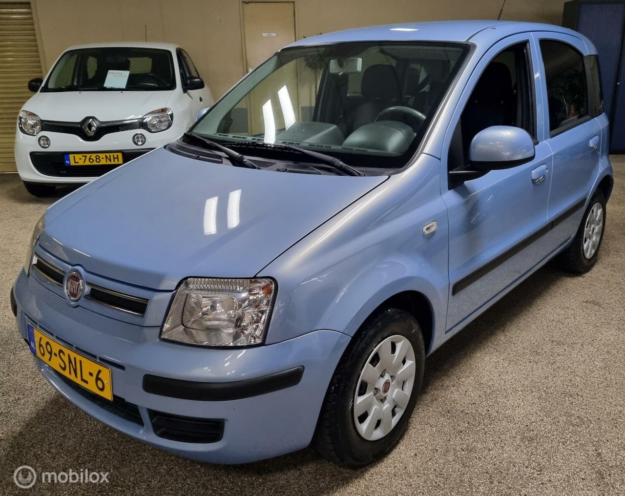 Fiat Panda - 1.2 Edizione Cool Dynamic zeer lage originele km - AutoWereld.nl