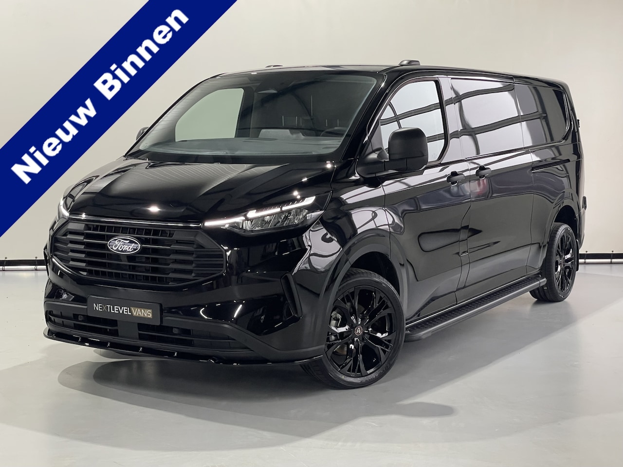 Ford Transit Custom - 136 PK 320 L2/H1 Next Level / Camera / 2 X schuifdeur / Led - AutoWereld.nl