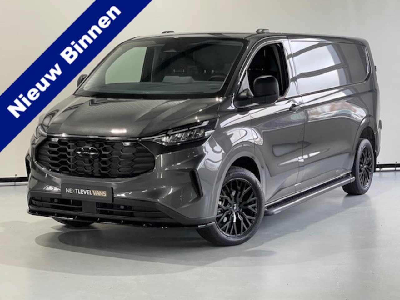 Ford Transit Custom - 300 2.0 TDCI L2H1 136 PK NEXT LEVEL EDITION Camera / Navigatie / Blind spot / Adaptieve cr - AutoWereld.nl