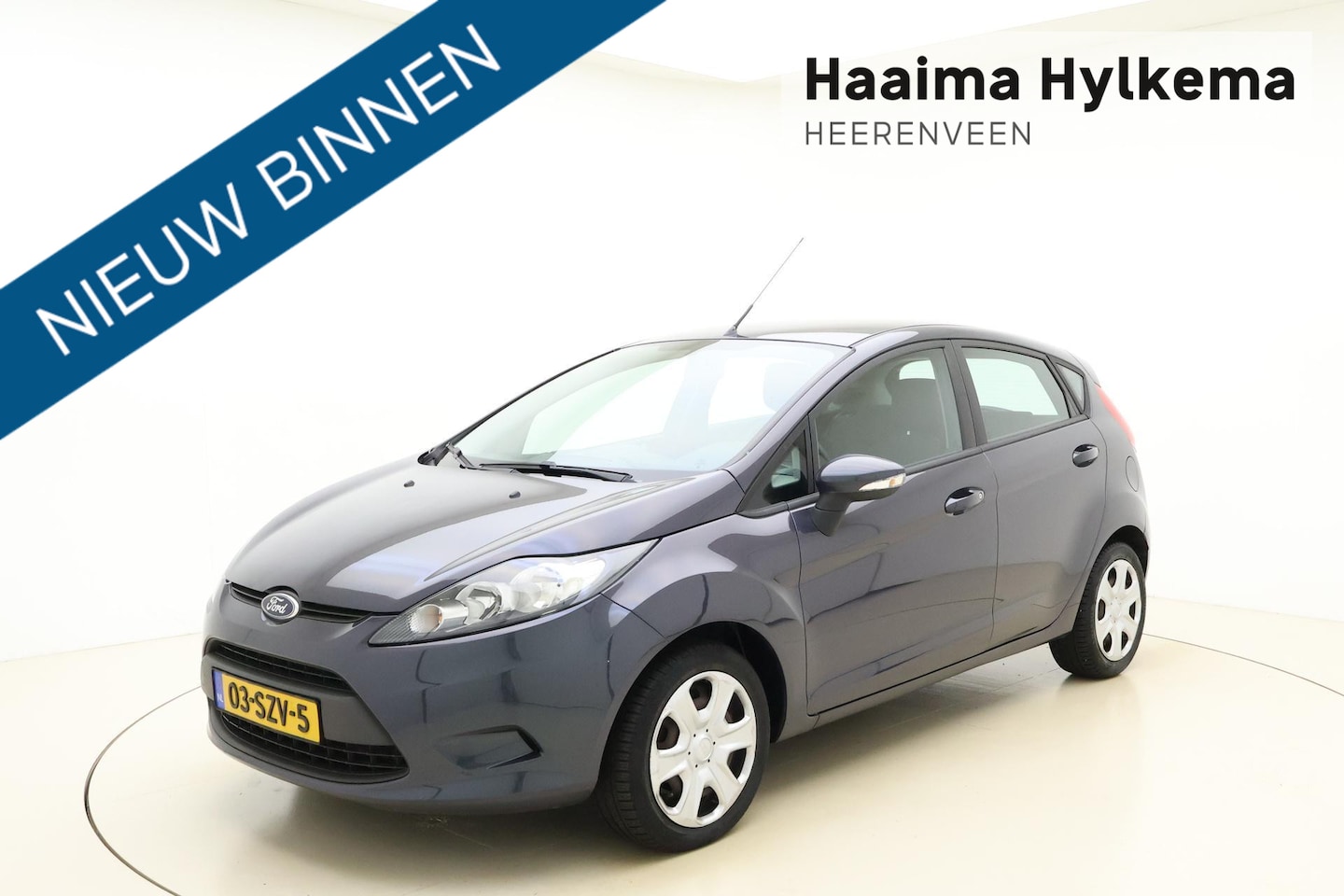 Ford Fiesta - 1.25 Ghia | Airconditioning | Verwarmbare spiegels | Lichtmetalen velgen - AutoWereld.nl