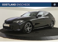 BMW 3-serie Touring - 318i High Executive M Sport Automaat / Panoramadak / Trekhaak / Sportstoelen / Stoelverwar