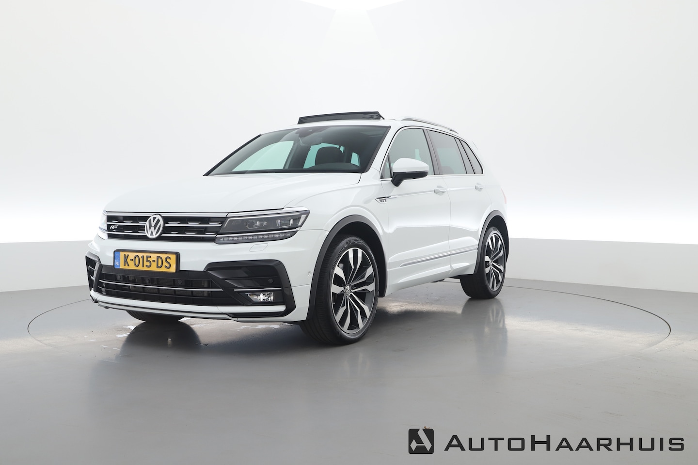 Volkswagen Tiguan - 2.0 TSI 4Motion R-Line DSG 220pk | Pano | 360cam | Elek. Trekhaak | Navi | Adapt. Cruise | - AutoWereld.nl