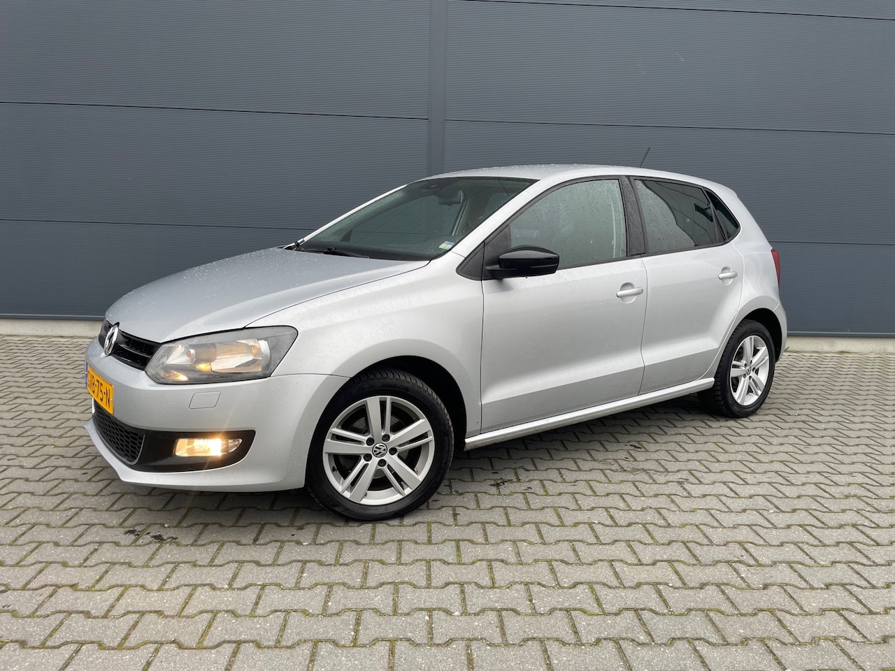 Volkswagen Polo - 1.2 highline cruise / lmv / pdc / stoelverwarming - AutoWereld.nl