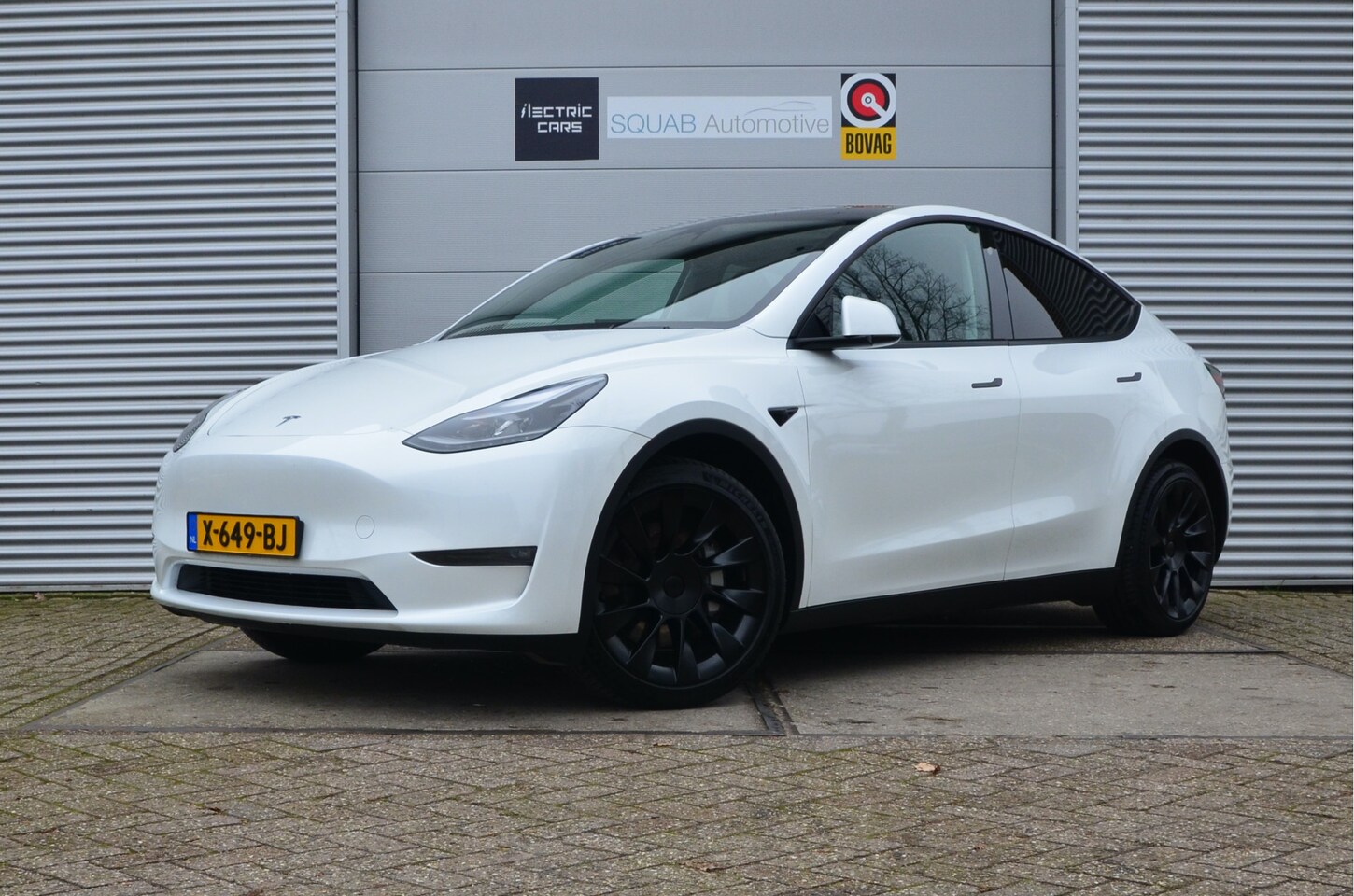 Tesla Model Y - Long Range AWD 75 kWh Trekhaak, 20", AutoPilot - AutoWereld.nl