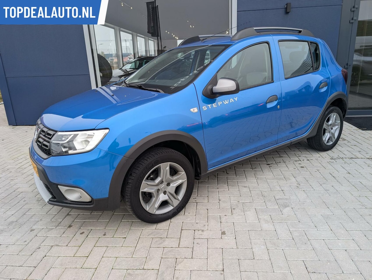 Dacia Sandero Stepway - 0.9 TCe SL Stepway/Navi/Pdc/Camera/Nieuw - AutoWereld.nl