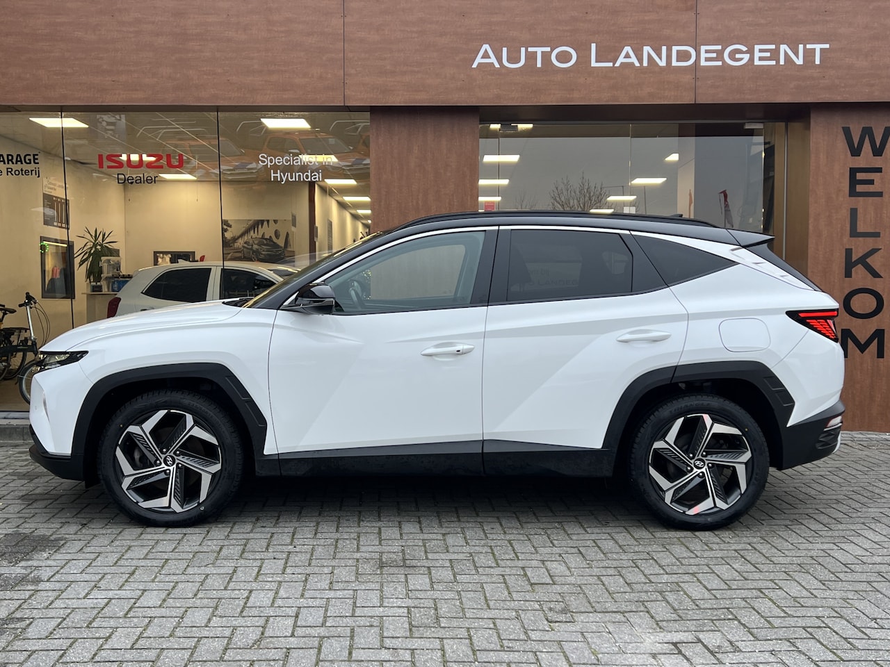 Hyundai Tucson - 1.6 T-GDI PHEV Comfort Smart 1.6 T-GDI PHEV Comfort Smart Sky - AutoWereld.nl