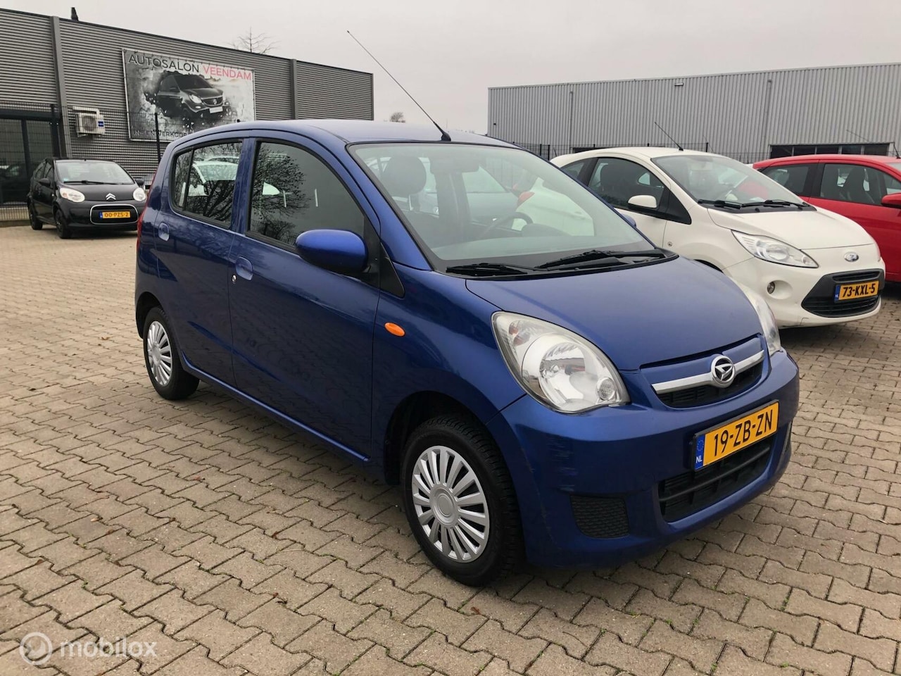 Daihatsu Cuore - 1.0 4DRS AIRCO ELL PAK NW APK - AutoWereld.nl