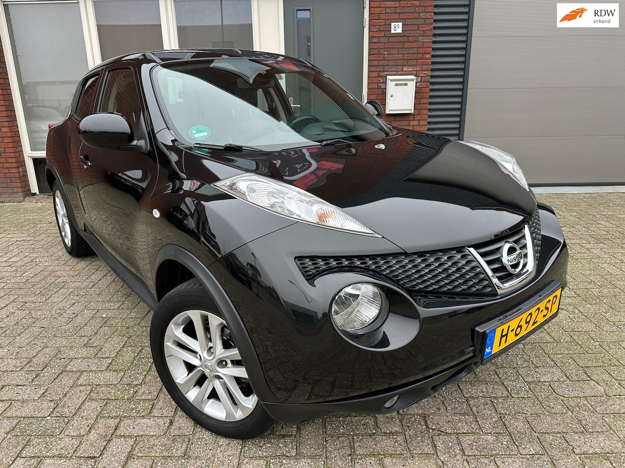 Nissan Juke - 1.6 Urban Premium / Navi / Leder / Camera / Cruise - AutoWereld.nl