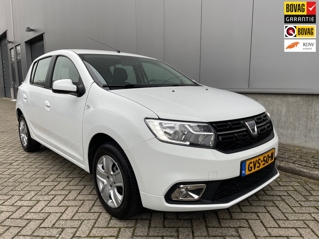 Dacia Sandero - 1.0 SCe Laureate / Airco / Navigatie / Trekhaak - AutoWereld.nl