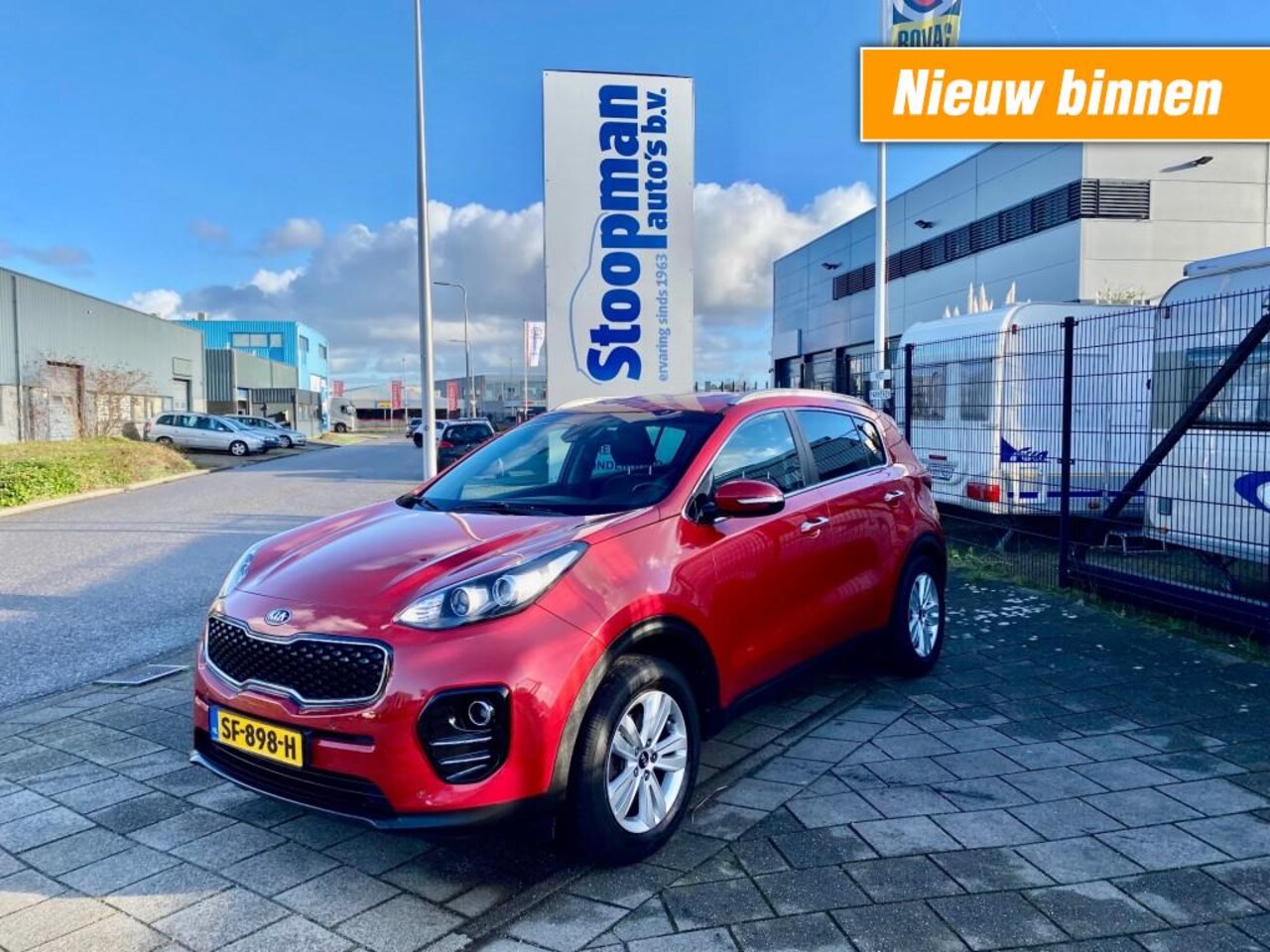 Kia Sportage - 1.6 Design Edition Clima Cruise Leder Navi Bluetooth - AutoWereld.nl