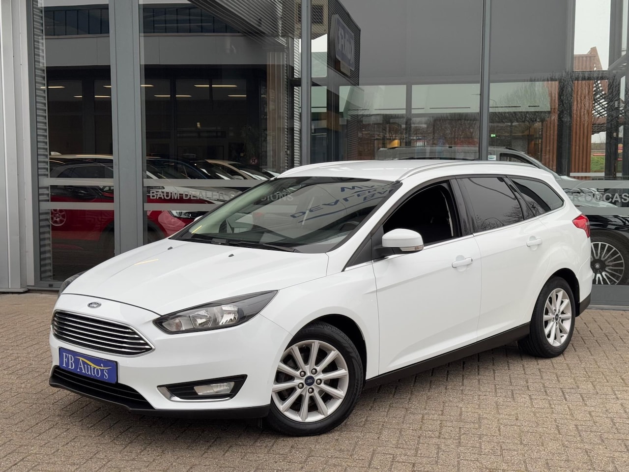 Ford Focus Wagon - 1.0 First Edition Navi Airco Lmv Cruise - AutoWereld.nl