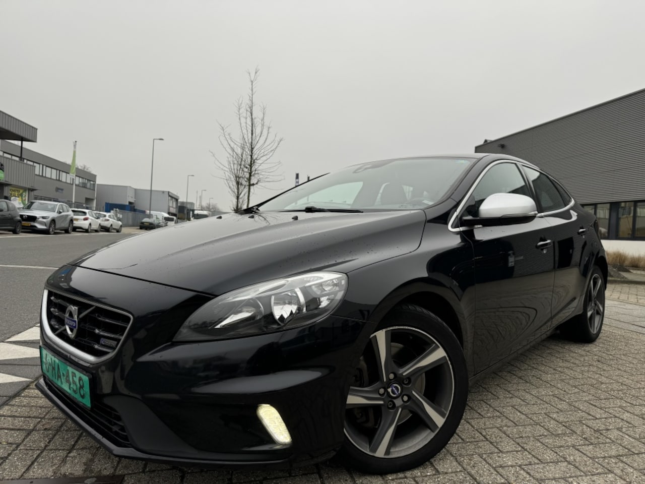 Volvo V40 - 2.0 D4 R-Design Navigatie|Leer 2014 - AutoWereld.nl