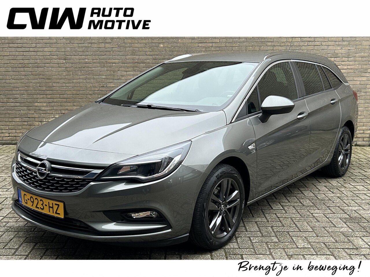 Opel Astra Sports Tourer - 1.0 Turbo 120 Jaar Edition+ | 24.000km NAP | Climate control | Cruise control | Apple Carp - AutoWereld.nl