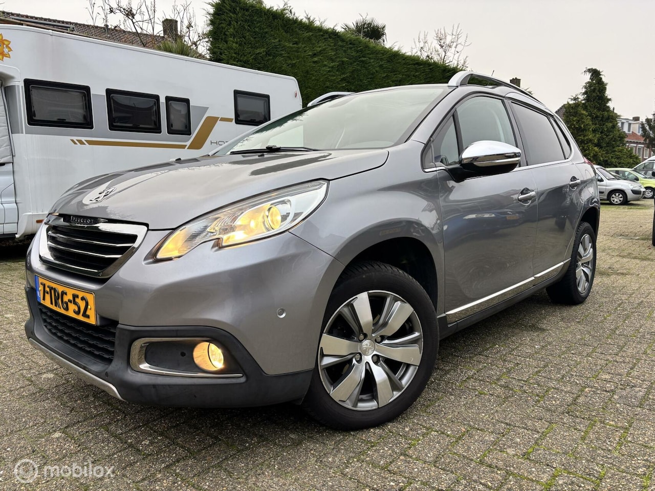 Peugeot 2008 - 1.2 VTi Allure Pack Premium Plus / 34.600km!! - AutoWereld.nl