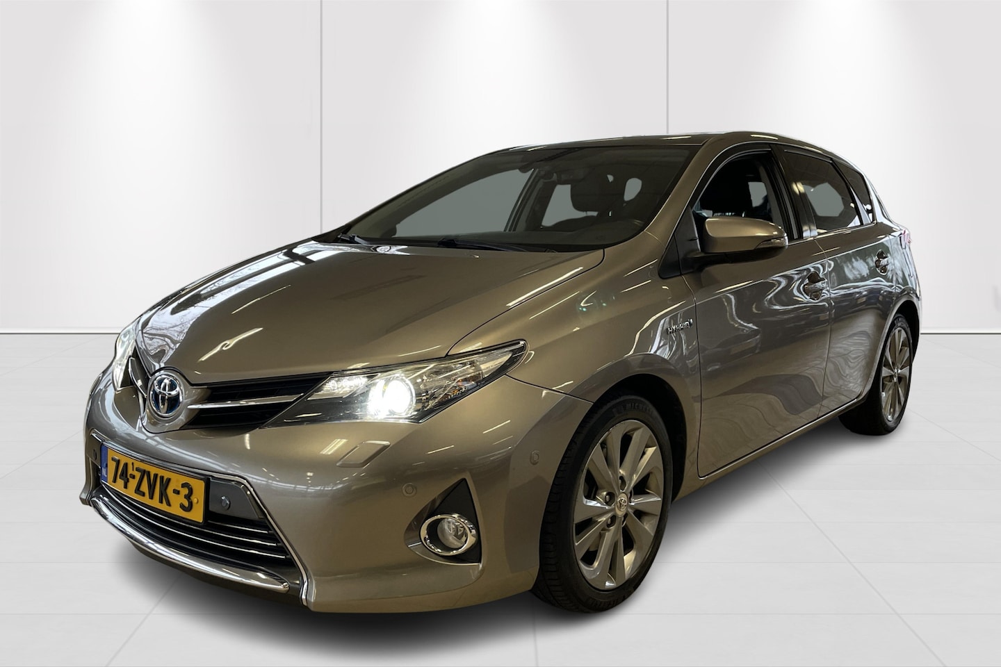 Toyota Auris - 1.8 Hybrid Lease Pro Stoelverwarming | Parkeersensoren | Clima/cruise control - AutoWereld.nl