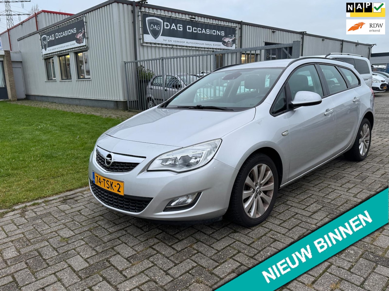 Opel Astra Sports Tourer - 1.4 Turbo Anniversary Edition NAVI|CRUISE|PDC|HALF LEER - AutoWereld.nl