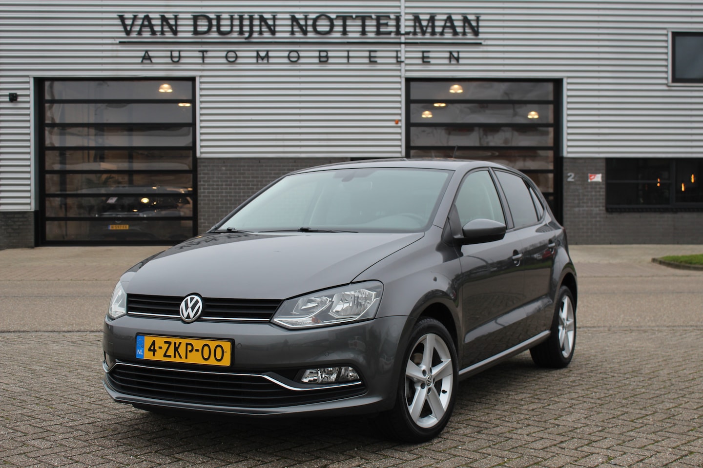 Volkswagen Polo - 1.2 TSI Highline / PDC / Clima / LMV 17" / N.A.P. - AutoWereld.nl