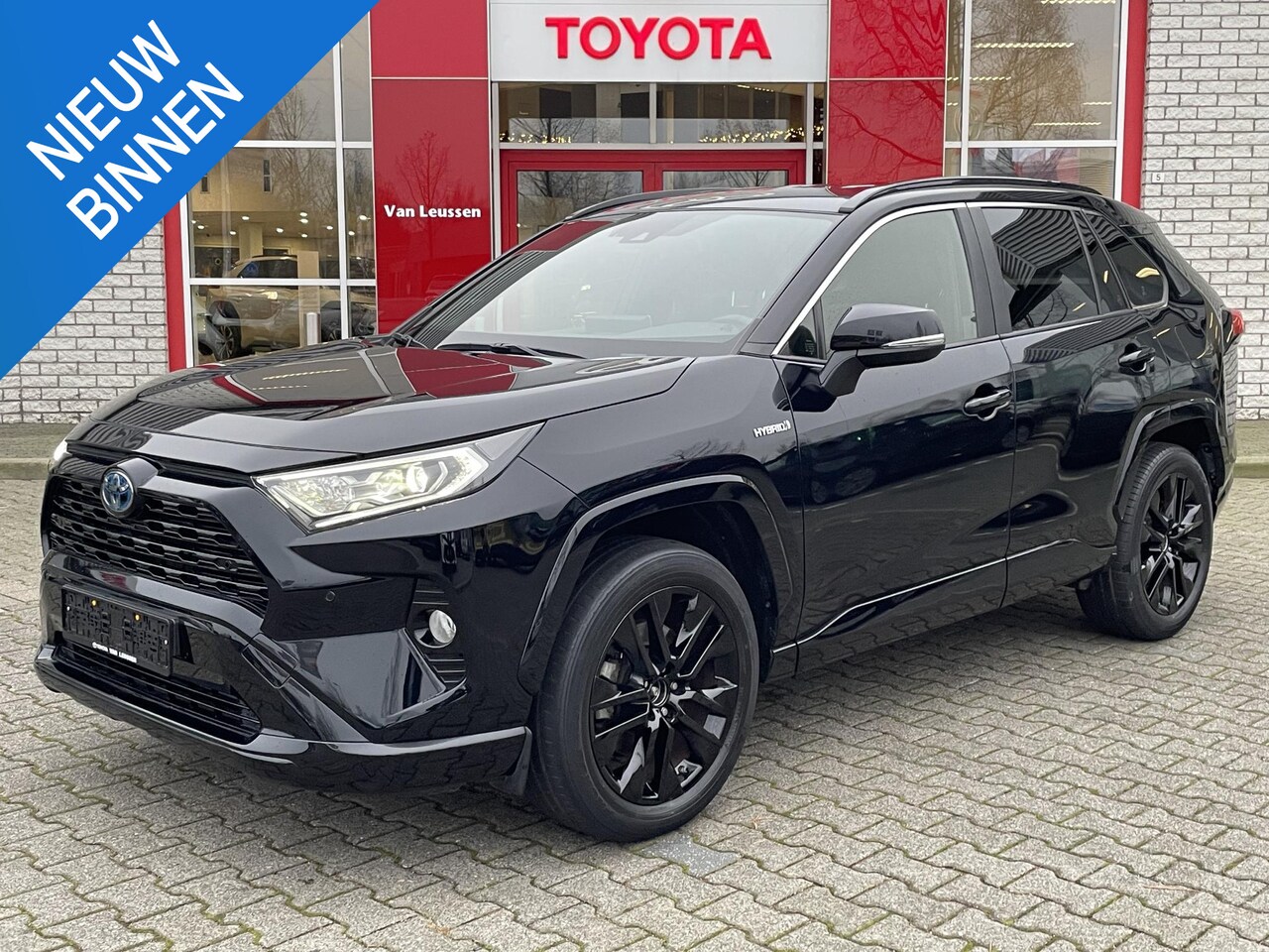 Toyota RAV4 - 2.5 HYBRID AWD BLACK EDITION STOELVERW EL-STOEL NAVI PARK-SENSOREN APPLE/ANDROID 19" LM-VE - AutoWereld.nl