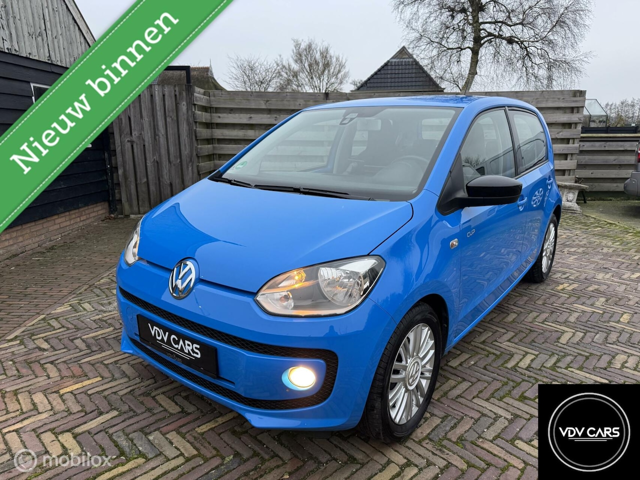 Volkswagen Up! - 1.0i 75pk CUP Airco |Cruise | PDC | LMV | Navi - AutoWereld.nl