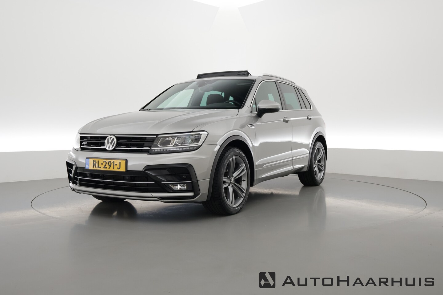 Volkswagen Tiguan - 1.4 TSI ACT R-Line 150pk | Elek. Trekhaak | 1.800kg Trekgewicht | Adapt. Cruise | Navi | K - AutoWereld.nl