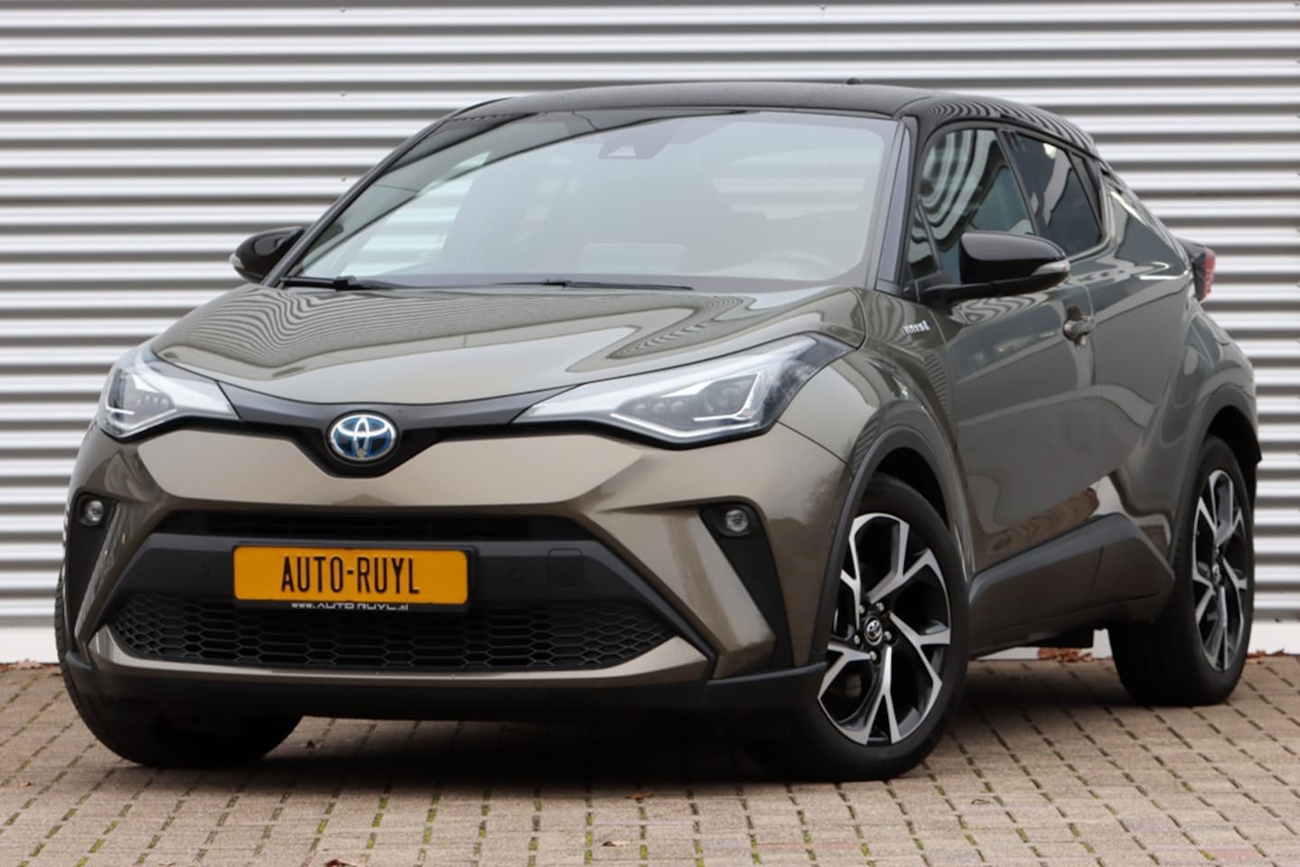 Toyota C-HR - 2.0 Hybrid Style Luxury Two-Tone JBL / Leer - AutoWereld.nl