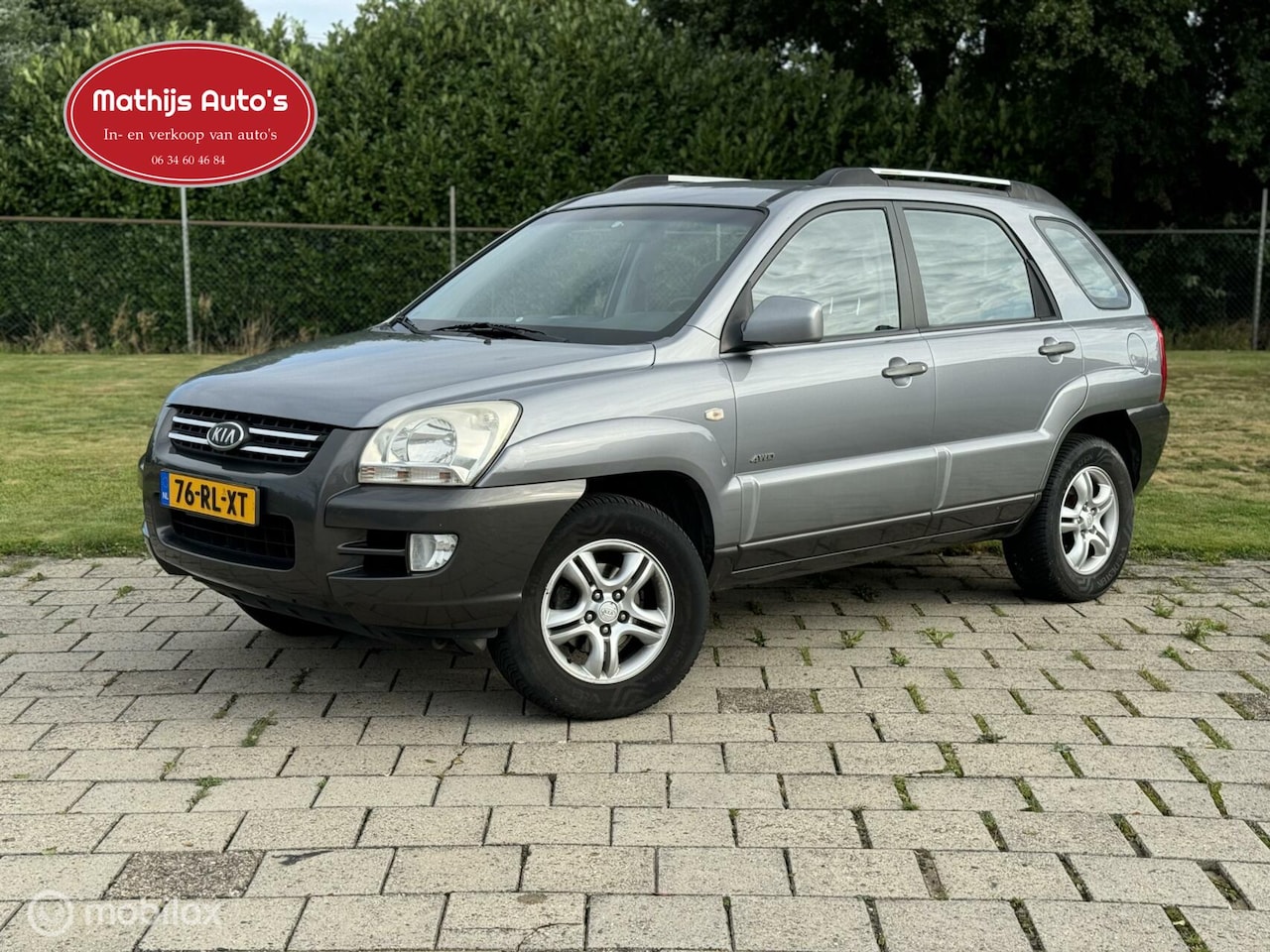 Kia Sportage - 2.7 V6 Adventure 4WD LPG G3 Automaat! - AutoWereld.nl