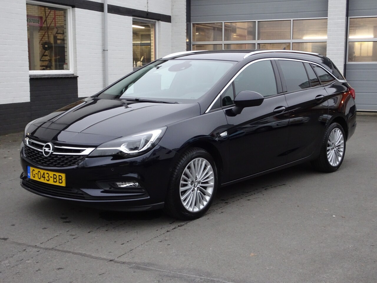 Opel Astra Sports Tourer - 1.4 Turbo Innovation Automatische airco, navigatie, parkeersensoren, cruise controle, lich - AutoWereld.nl