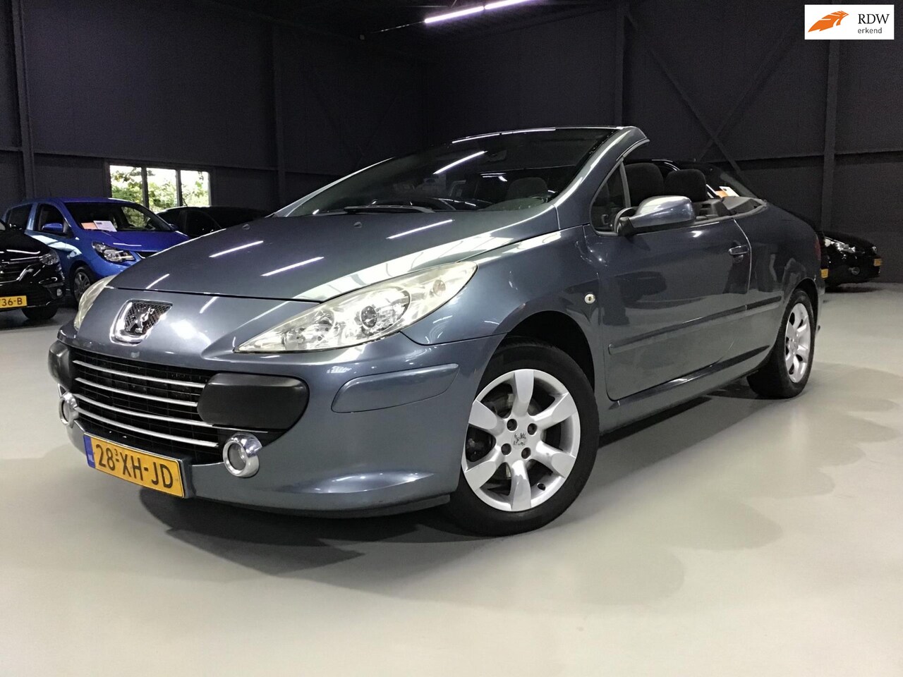 Peugeot 307 CC - 2.0-16V I 12-2025 APK I 157xxx km I Clima I Cruise Control I Park. sens. I 16inch LMV I Ce - AutoWereld.nl