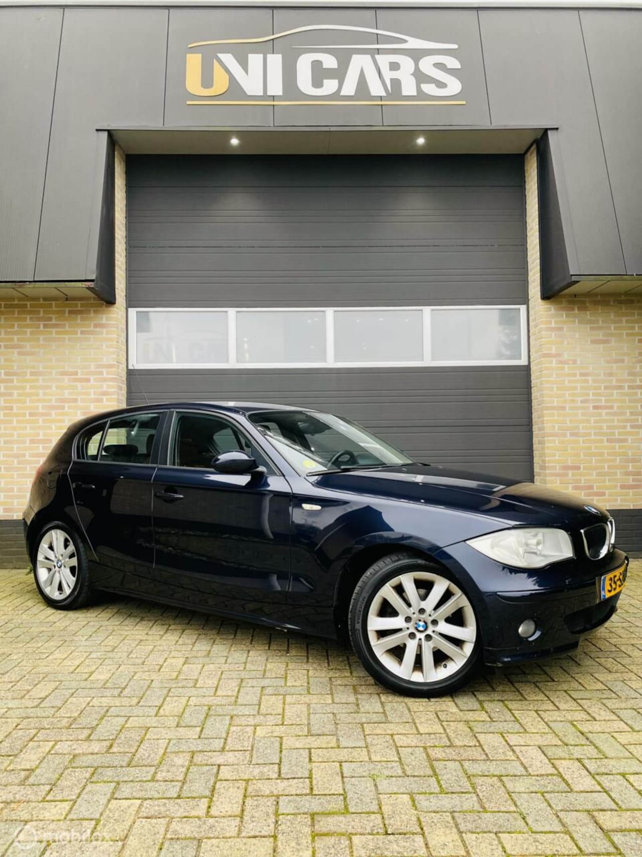 BMW 1-serie - 120i High Executive|Cruis|Clima|Navi|leder|LM 17 - AutoWereld.nl