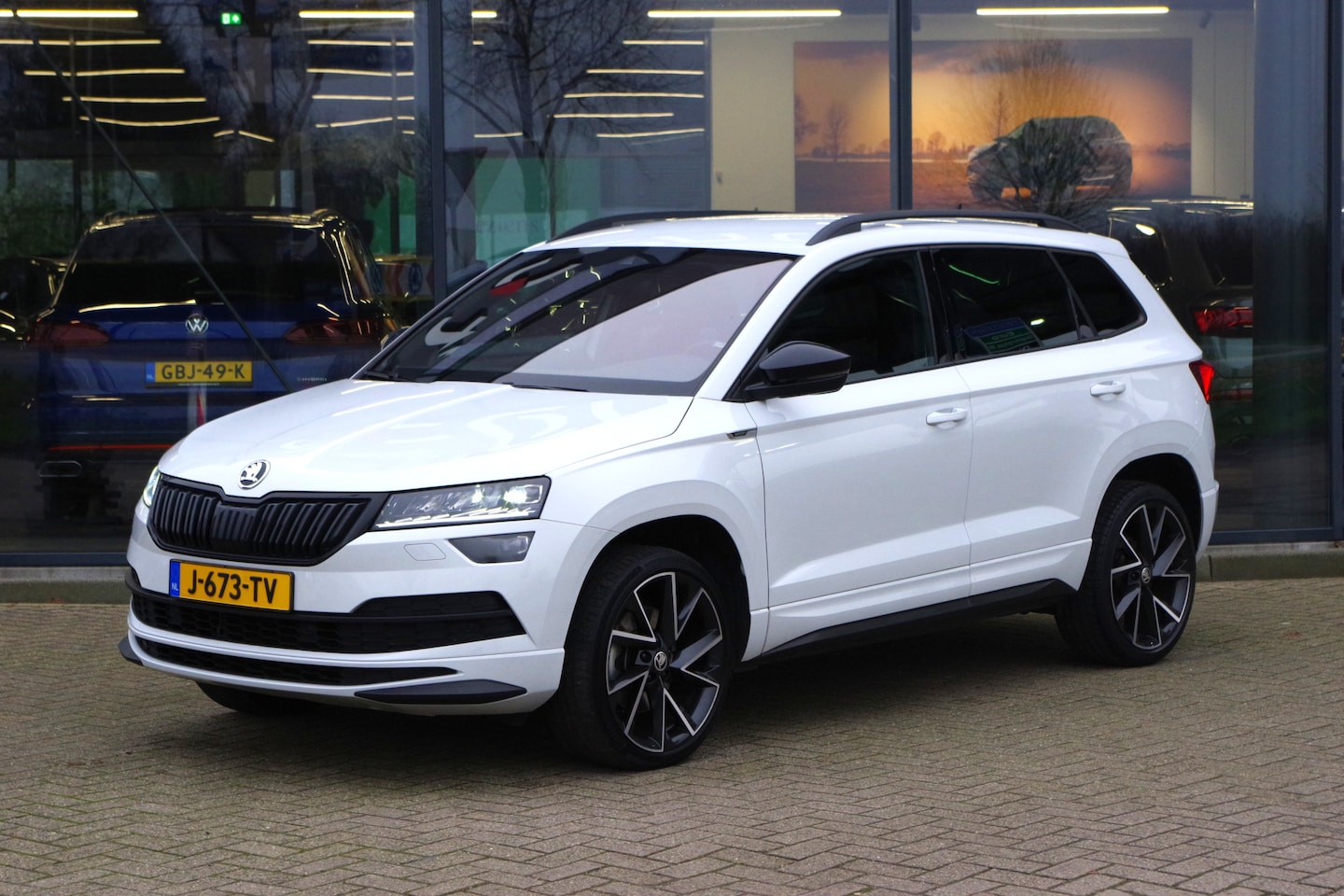 Skoda Karoq - 1.5 TSI ACT 150 PK AutomaatSportline BNS, LED, Canton Sound, Keyless, Camera, Climate Cont - AutoWereld.nl