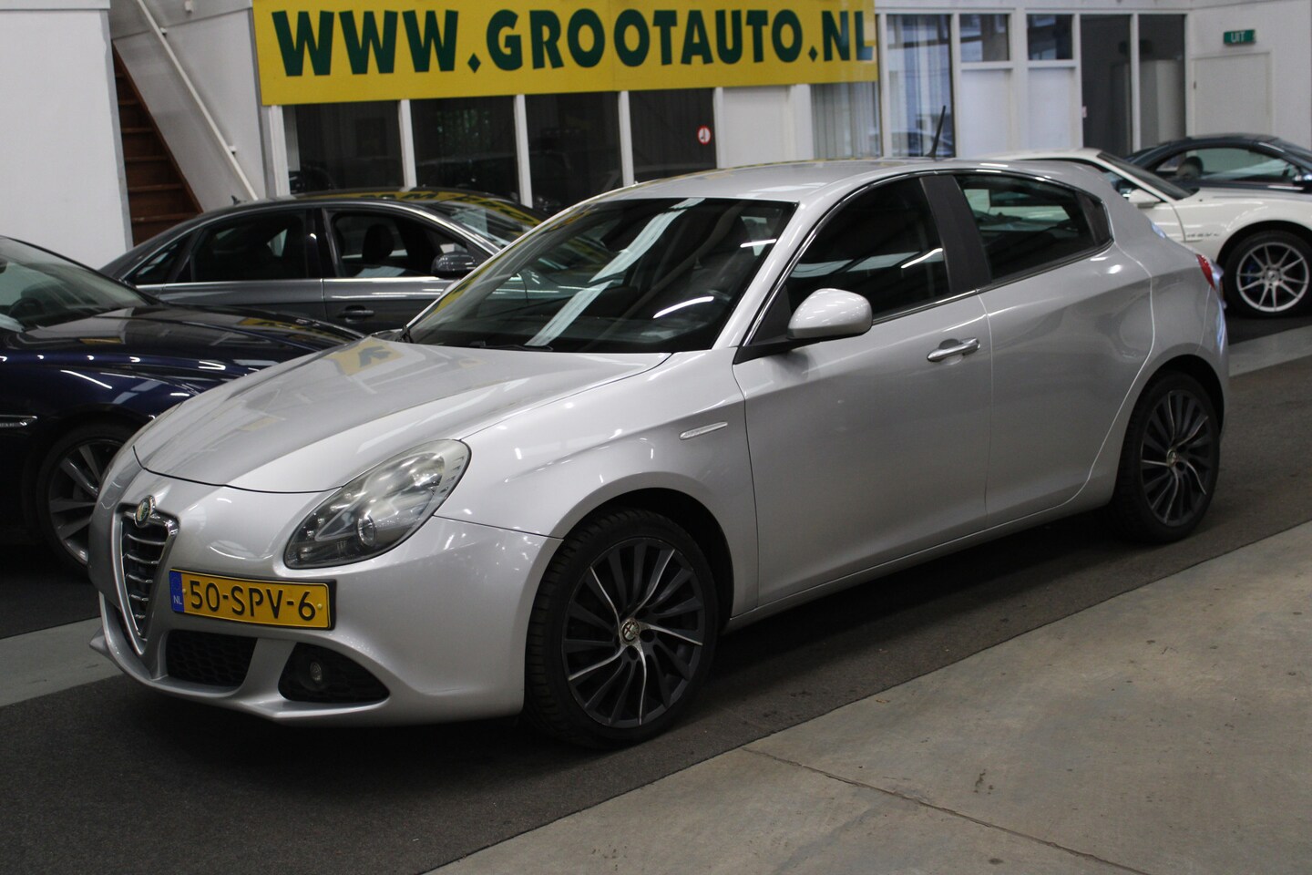 Alfa Romeo Giulietta - 1.4 T Distinctive Airco, Leer, Volledig onderhouden, Cruise control - AutoWereld.nl